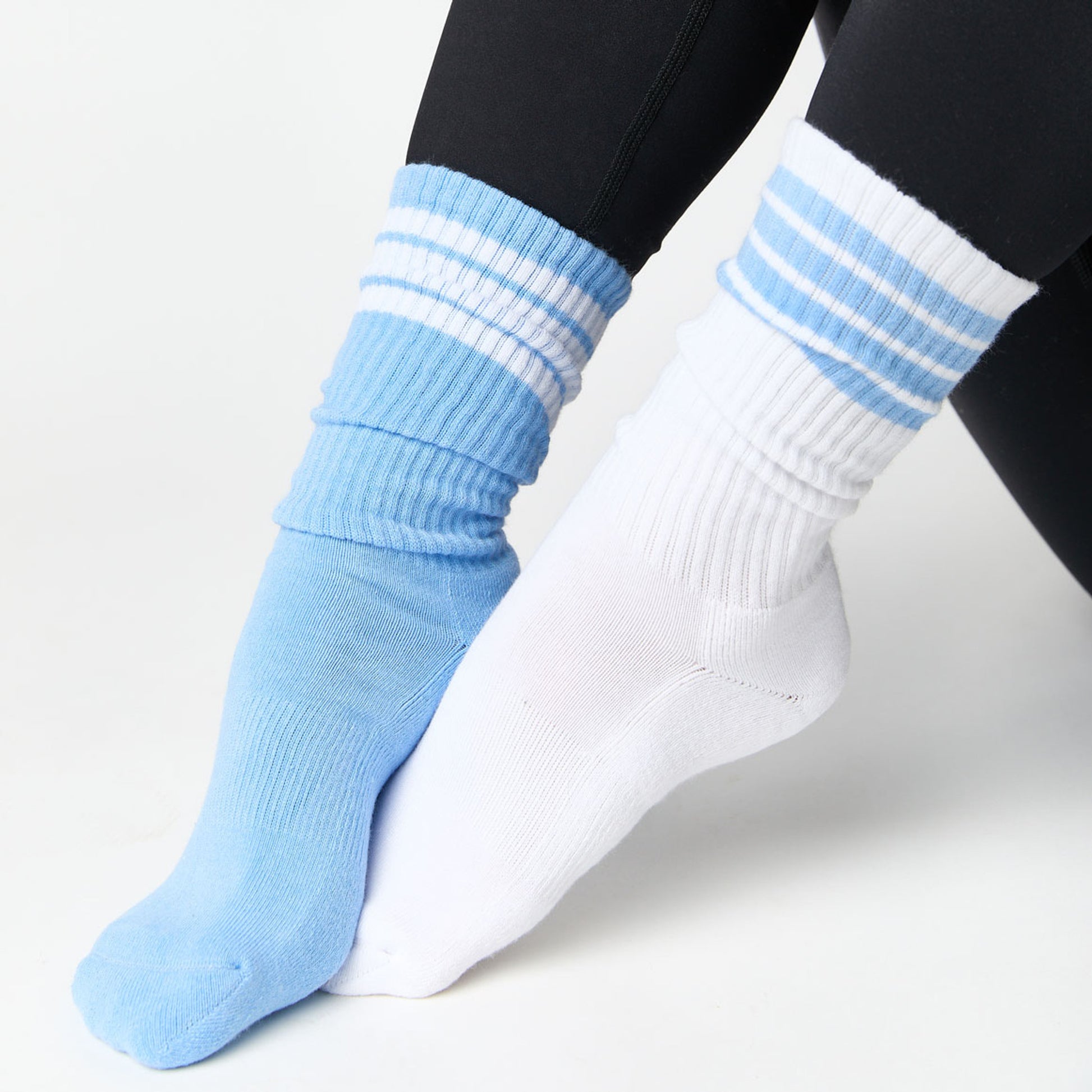 white crew socks with 4 thin stripes on the leg