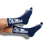 Navy casual crew socks with Ole Miss going up the leg in white.