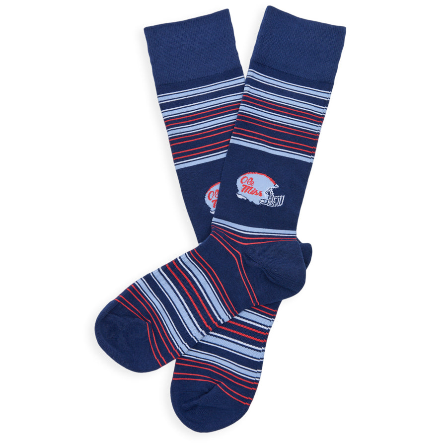 Navy blue socks with red and white striped pattern and an Ole Miss football helmet on the ankle on a white background