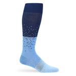 Knee-high sock with blue and white polka dot pattern on a white background