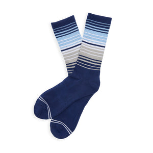 Pair of blue striped socks on a white background