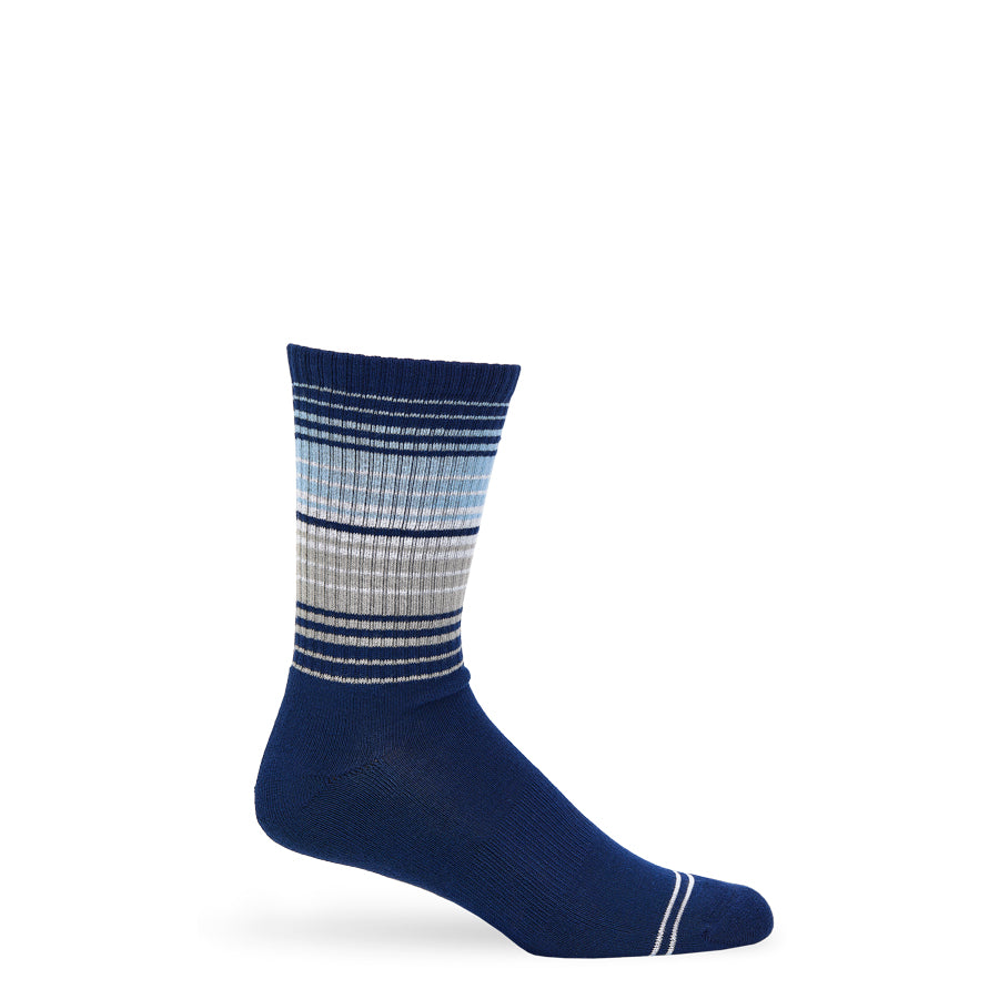 Navy casual crew socks with blue ombre stripe detailing, shown worn and in flat lay photography.

