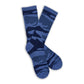 Lay-flat pair of Navy Sip Camo Crew Socks showing tonal blue camouflage and ‚ÄúThe Sip‚Äù branding.
