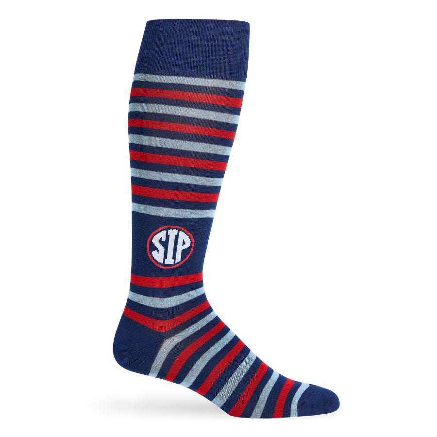 Knee-high sock with blue, red, and powder blue stripes and SIP on ankle on a white background
