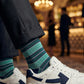 Noah mint green stripe dress socks styled with sneakers for casual wear