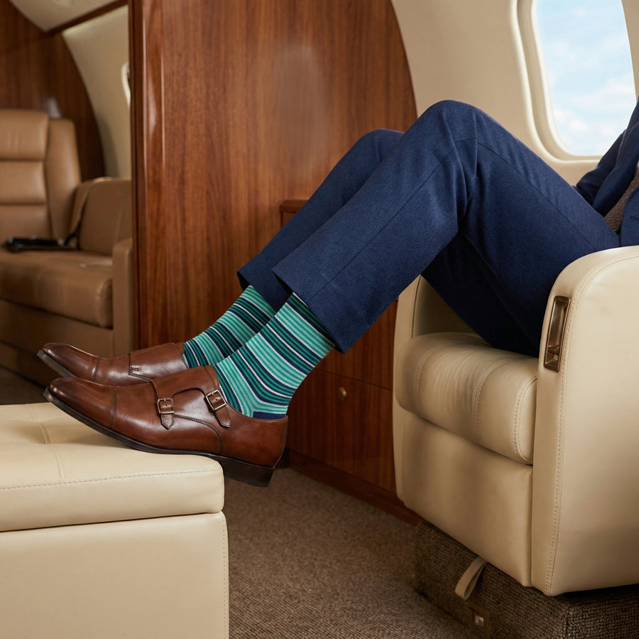 Noah mint stripe dress socks styled in travel setting