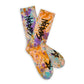 Not.Travis casual collab socks with peach colored tie dye design shown laid out flat.