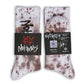 Not.Travis casual collab socks with brown tie dye design showing the signed label and authentication number.