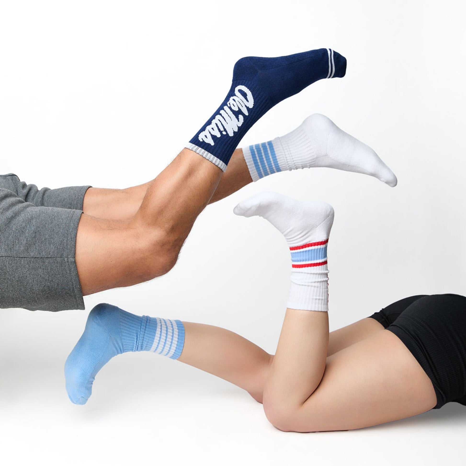 man and woman wearing 4 casual crew ole miss designs