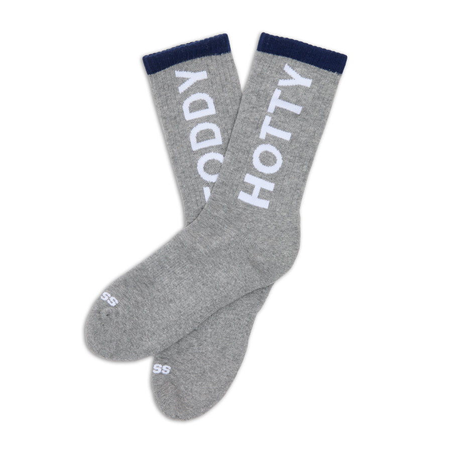 Gray socks with 'HOTTY TODDY' text on a white background