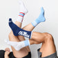 group shot with white crew socks with 4 thin stripes on the leg product shown