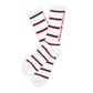 White athletic crew socks with stripe design and OLE MISS written down the back of the leg laid out flat.