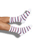 White casual athletic crew socks with stripe design and OLE MISS written down the back of the leg
