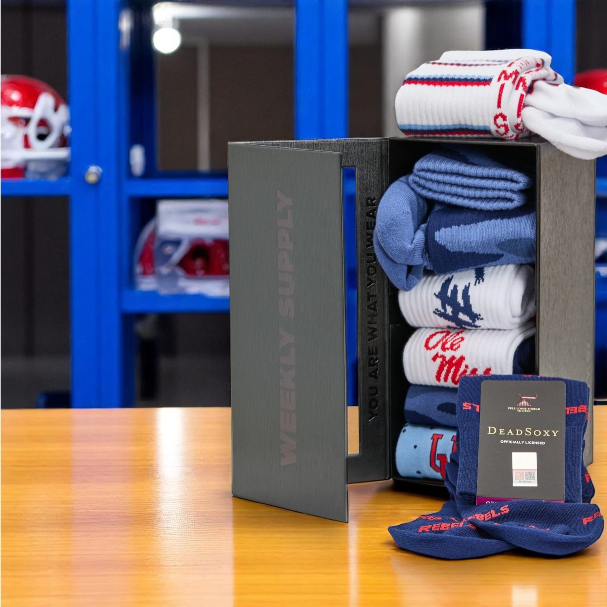 powder blue dress socks with Ole Miss on leg and wave design