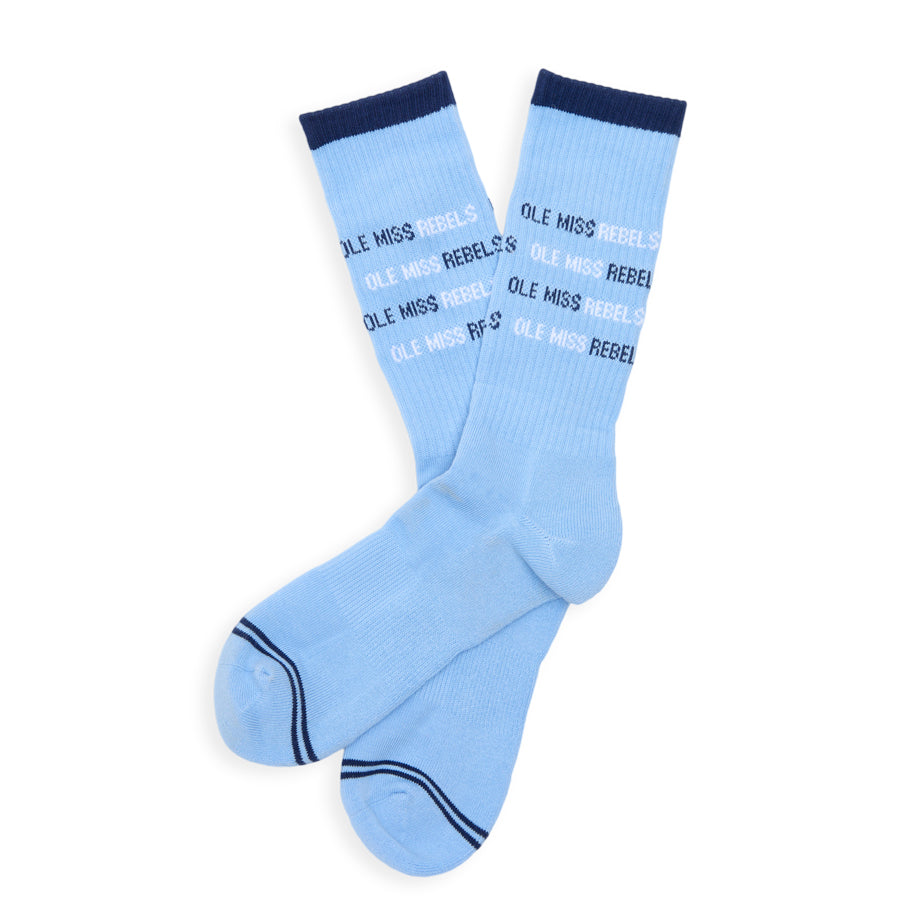 Powder blue Ole Miss athletic crew socks shown worn and laid flat.