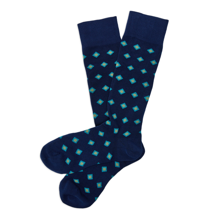 Parker dress socks flat lay showing full teal and gold diamond foulard pattern