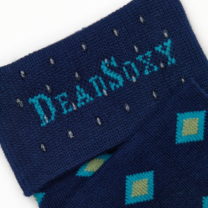 Close-up of Parker dress sock welt detail showing deep navy ribbed cuff