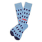 Licensed powder blue dress socks with the state outline in navy and the Ole Miss script logo in red on the ankle laid flat