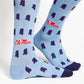 Licensed powder blue dress socks with the state of Mississippi outline in navy and the Ole Miss script logo in red on the ankle laid flat