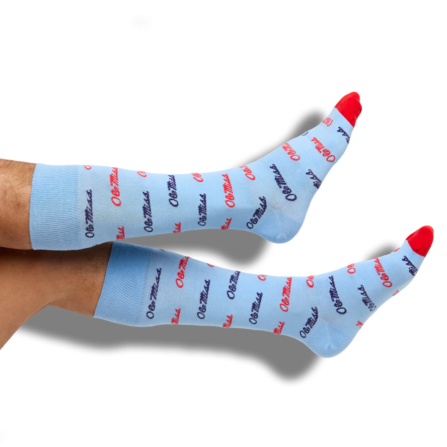 Light blue socks with red accents and text on a white background