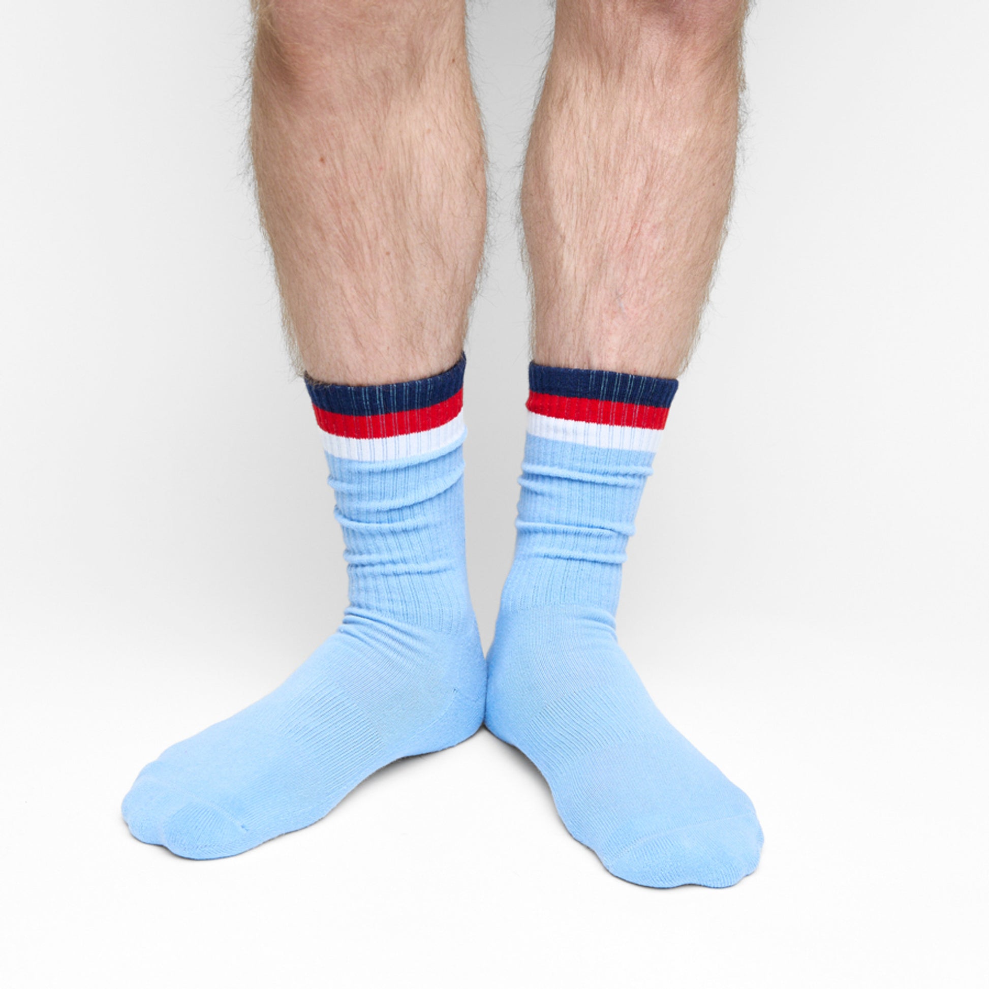 powder crew socks on male legs standing