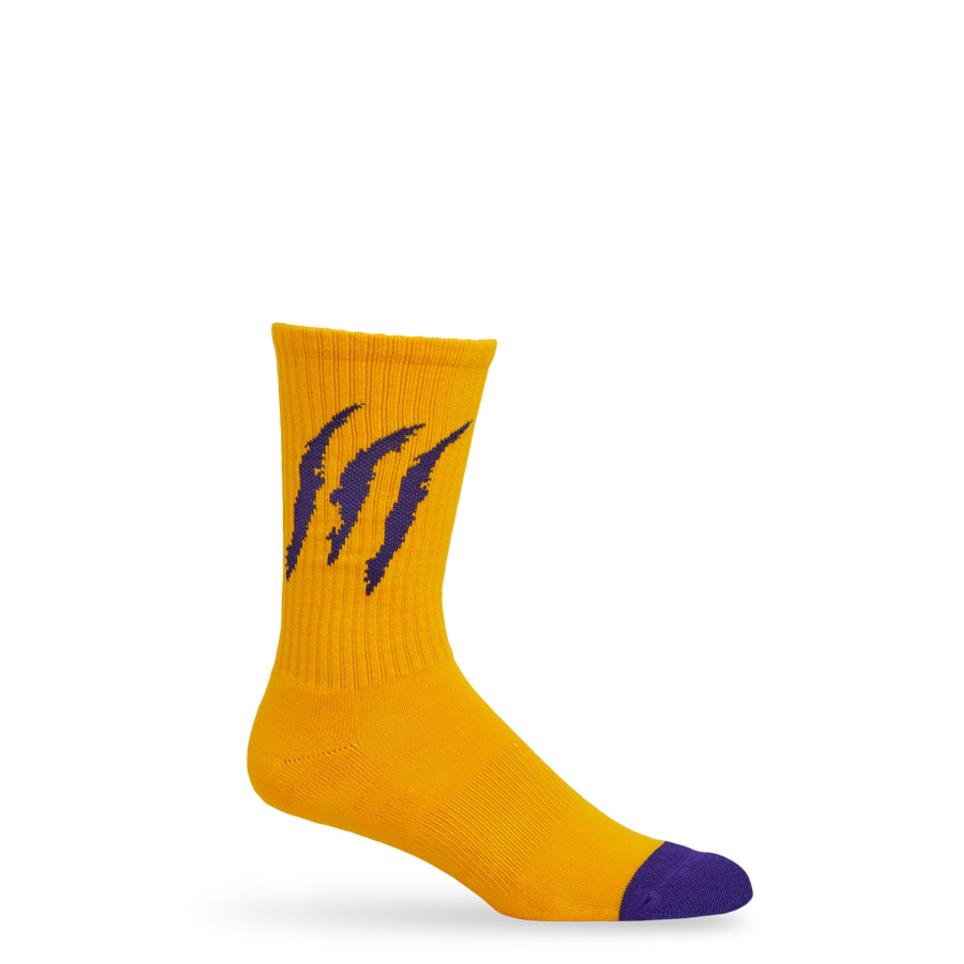 Yellow casual socks with scratch marks on leg