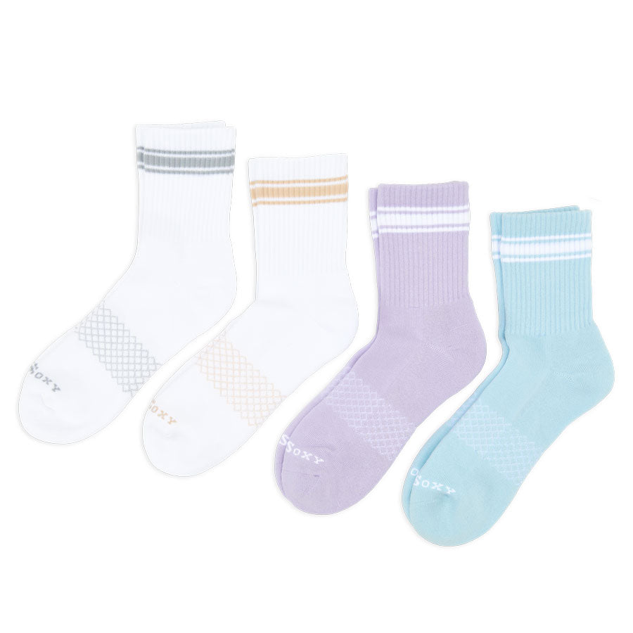 Four-pair women’s quarter crew sock bundle in assorted striped colorways displayed against a white background.