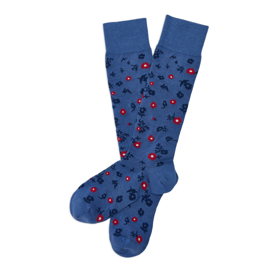 Richie dress socks flat lay showing full blue and crimson floral pattern