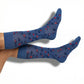 DeadSoxy Richie dress socks in denim blue with red floral pattern worn on foot