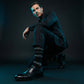 Ross black broken stripe dress socks under neon lighting