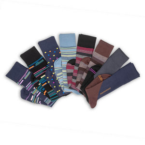 8 pairs of premium dress socks with mixed designs laid flat in a v shape