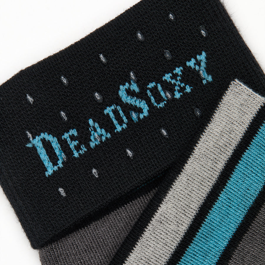 Close-up of Scott dress sock welt detail showing black ribbed cuff