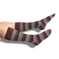 one pair of brown and cream dress socks with mini stripe colorblock design on legs