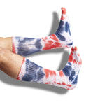 White and Navy and Red Tie-Dye casual crew athletic lounger sock shown on legs coming into the image from the left