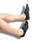 Black no show liner sock with stripe and patch design in blue, orange and yellow on legs