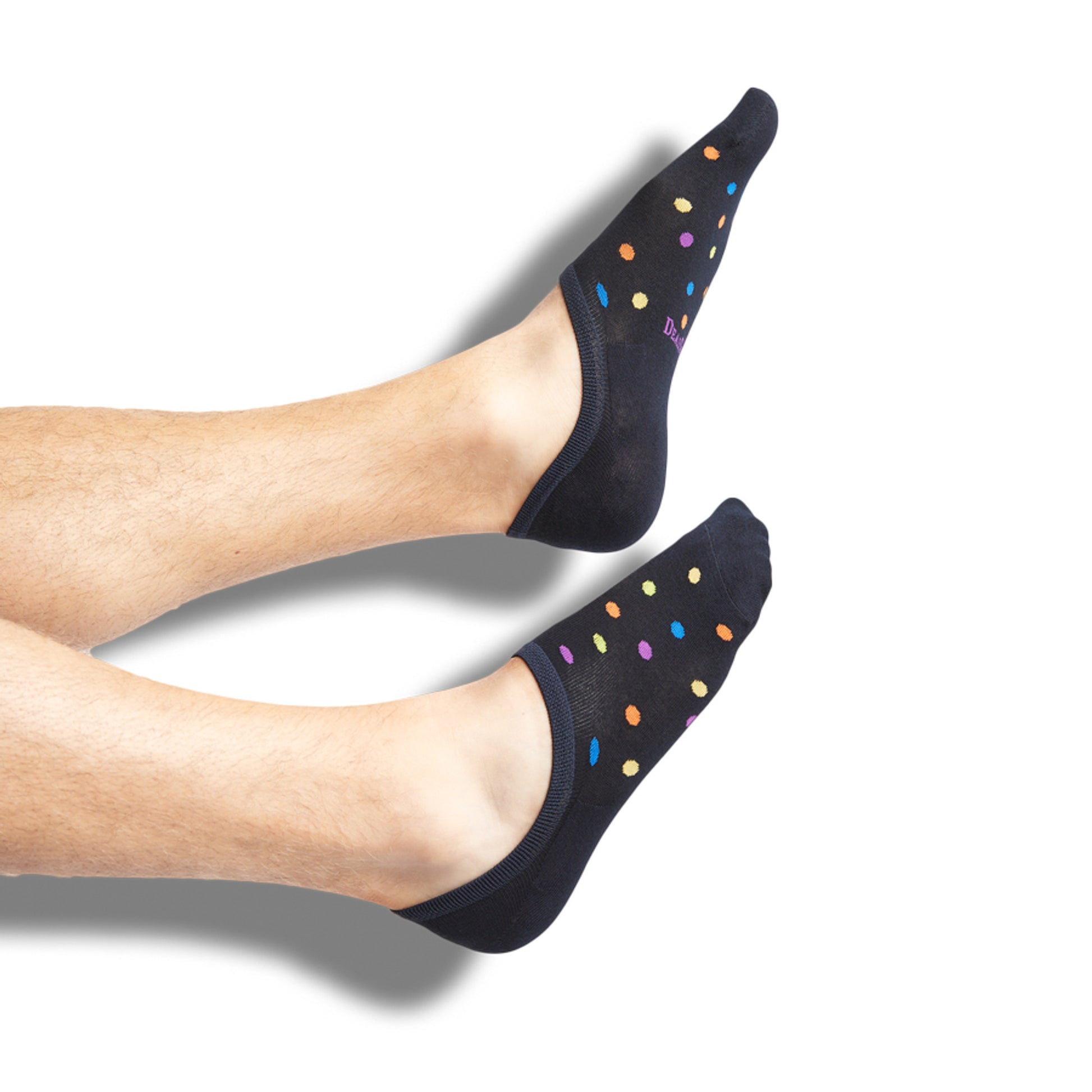 Navy no show socks with a multi-color dot design on legs