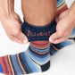 stripe dress socks with red, navy and cream color stripes showing TrueStay in the welt.