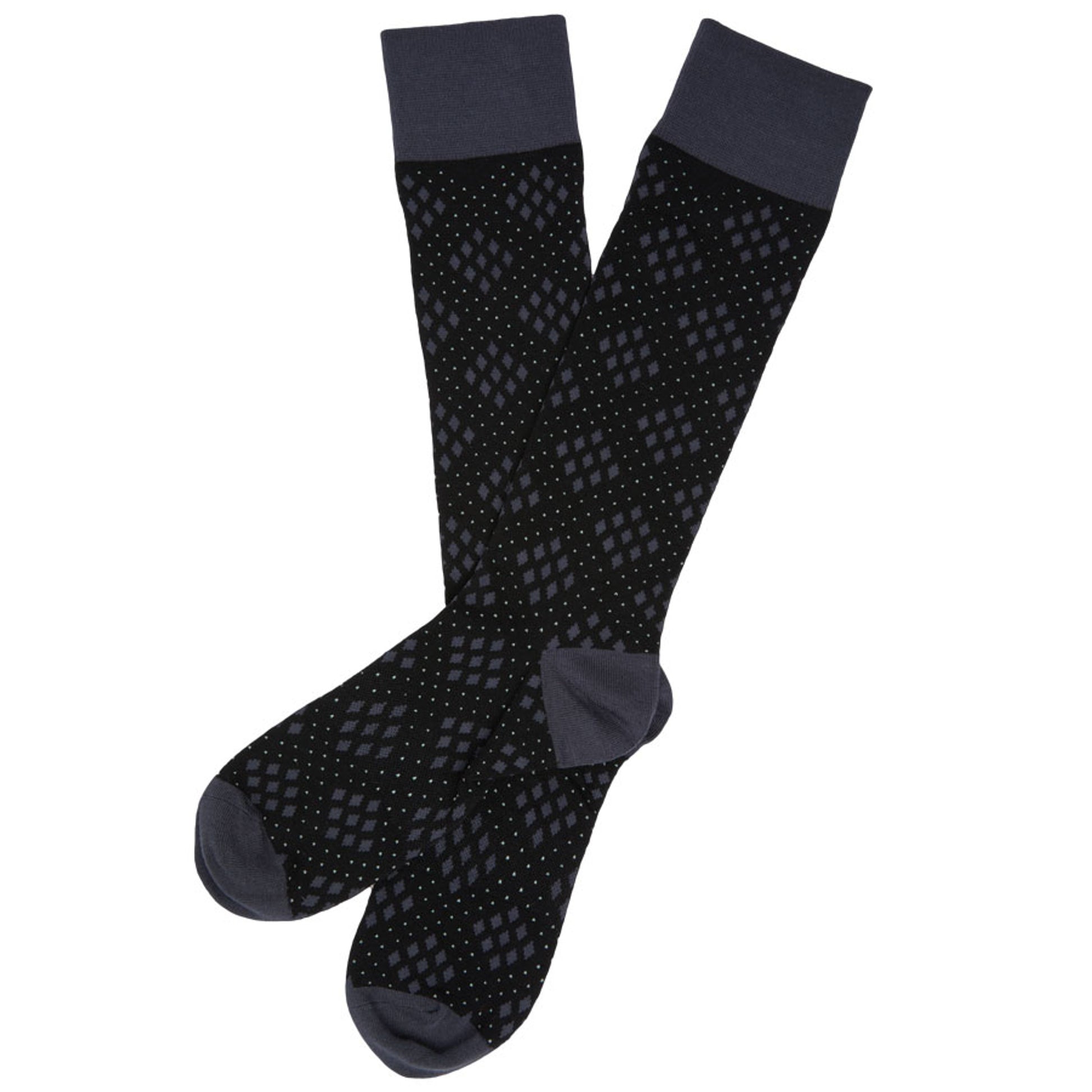 1 pair of black dress sock with a bigger diamonds made of smaller diamonds and dots laid out flat crossed at the heel