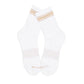 White and tan quarter crew socks laid flat to show striped design and construction.