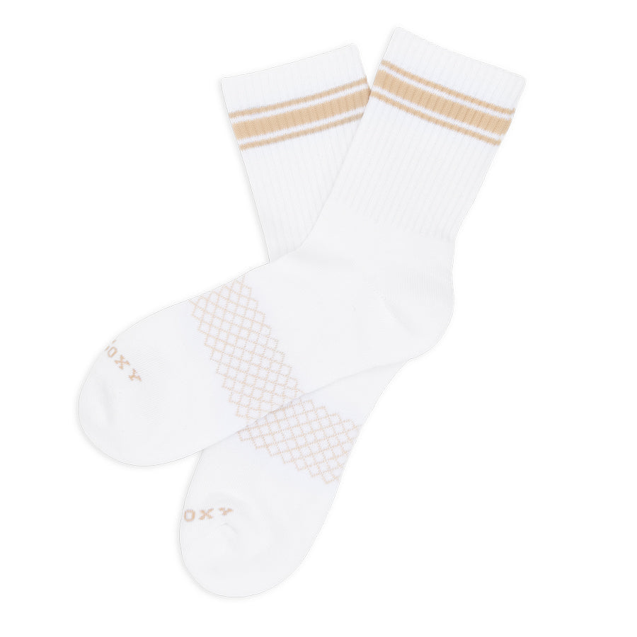 Alternate flat-lay of white and tan striped quarter crew socks highlighting heel and toe structure.