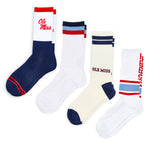 Four pairs of socks with 'Ole Miss' and other text designs on a white background