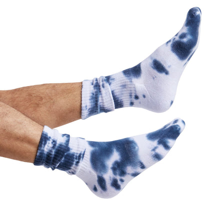 White and Navy Tie-Dye casual crew athletic lounger sock shown on legs coming into the image from the left