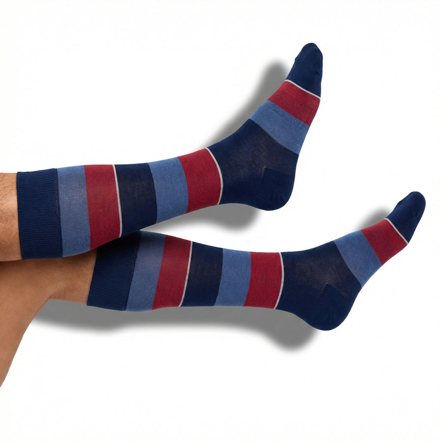 DeadSoxy Tomas dress socks in navy blue and red block stripe pattern worn on foot