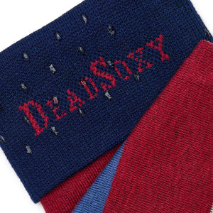 Close-up of Tomas dress sock welt detail showing dark navy ribbed cuff