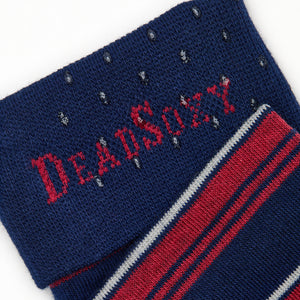 Close-up of Tommy dress sock welt detail showing dark navy ribbed cuff