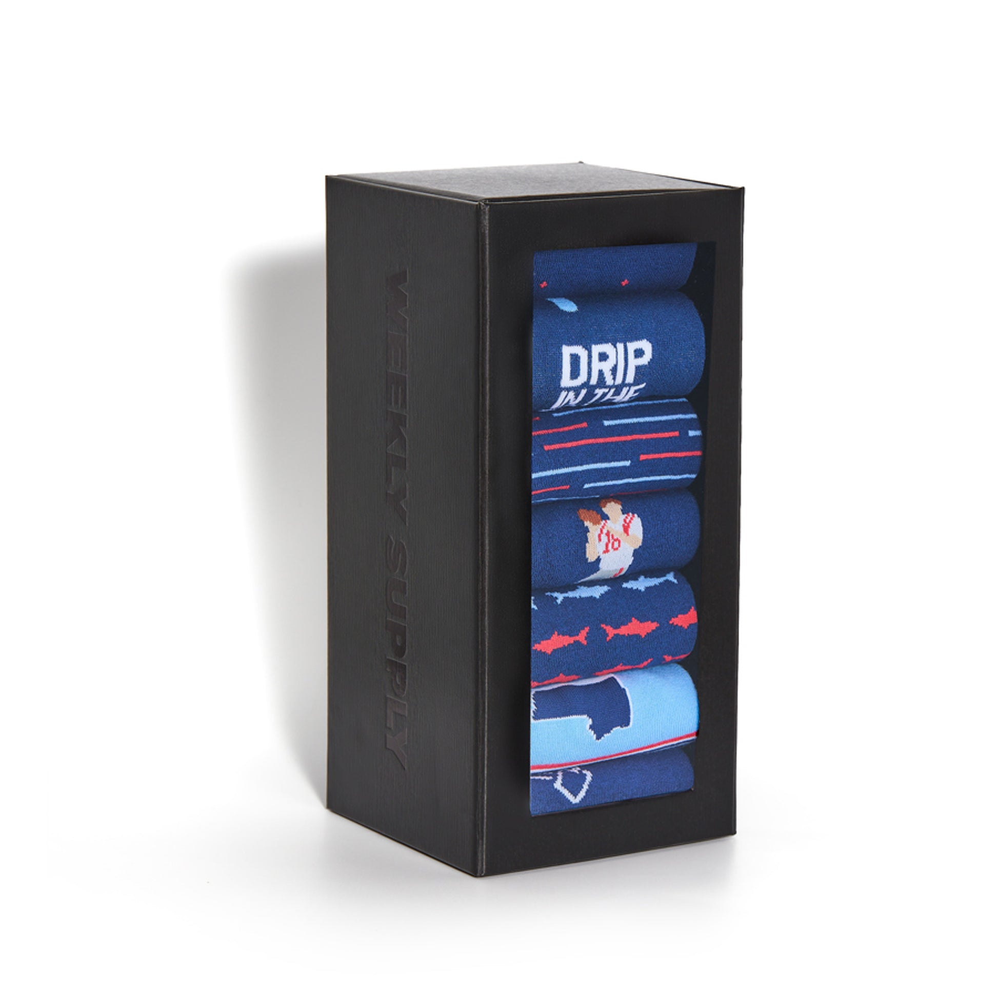 Beautiful black Weekly Supply box mixed with 7 pairs of casual crew and dress sock styles in red, navy blue and light blue colors.