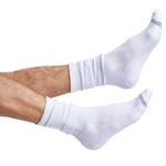 one pair of white crew socks with two accents on the toe shown on foot.
