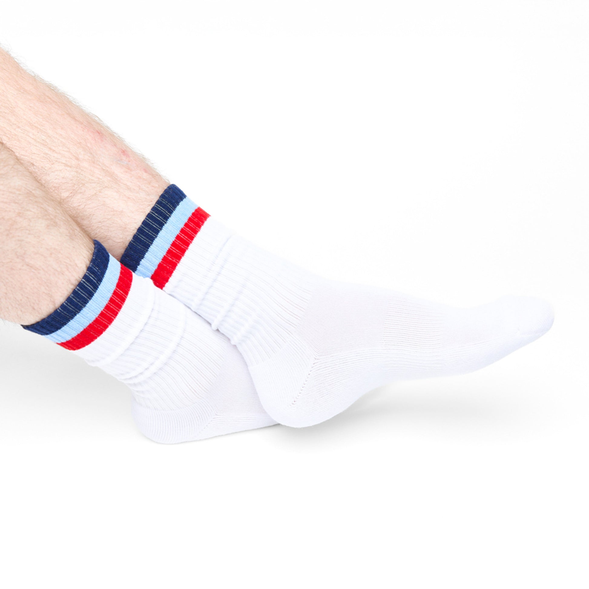 white crew socks on male legs standing
