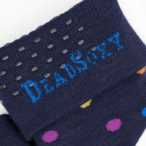 Navy dress socks with medium size dots in purple, orange, yellow, blue and green colors close up of TrueStay‚Ñ¢ in the welt.