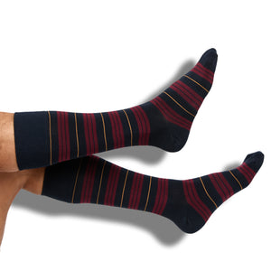 Navy dress socks with deep red stripe and gold accents